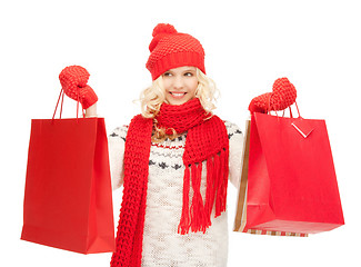 Image showing young girl with shopping bags