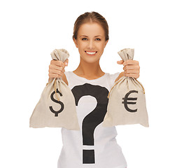 Image showing woman with dollar and euro signed bags