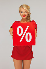 Image showing lovely woman in red dress with percent sign