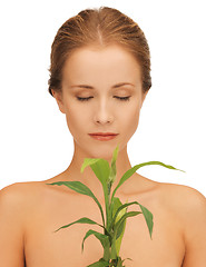 Image showing woman with green sprout