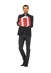 Image showing handsome man in suit with a gift box