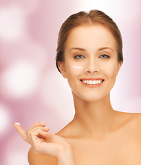 Image showing beautiful woman with moisturizing creme drop