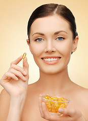 Image showing woman with vitamins