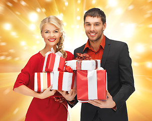 Image showing man and woman with gift boxes