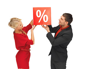 Image showing man and woman with percent sign