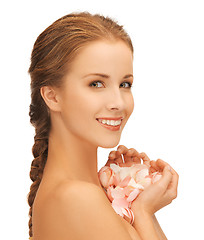 Image showing beautiful woman with rose petals