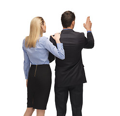 Image showing man and woman working with something imaginary