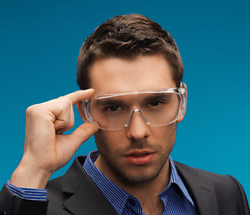 Image showing businessman in protective glasses