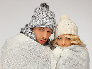 Image showing family couple under warm blanket