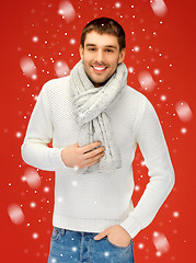 Image showing handsome man in warm sweater and scarf