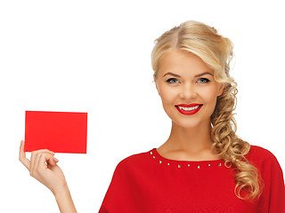 Image showing lovely woman in red dress with note card