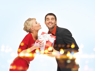 Image showing man and woman with present