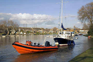 Image showing Red Dinghy and Boat