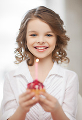 Image showing girl with cupcake