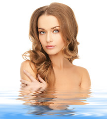 Image showing beautiful woman with long hair in water