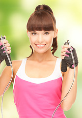 Image showing fitness instructor with jump rope