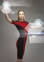 Image showing woman working with virtual touchscreens