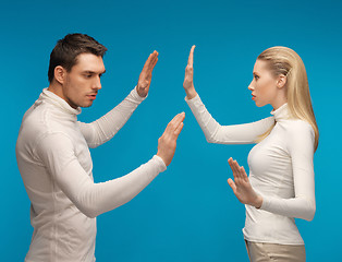 Image showing man and woman working with something imaginary