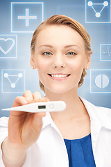 Image showing female doctor with thermometer