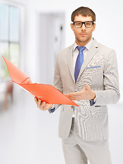 Image showing man with folders