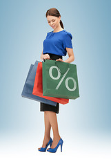 Image showing woman carrying shopping bags