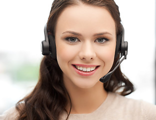 Image showing friendly female helpline operator