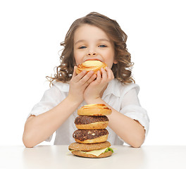 Image showing girl with junk food