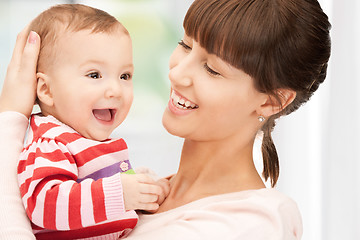 Image showing happy mother with adorable baby