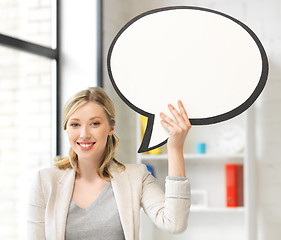 Image showing smiling businesswoman with blank text bubble