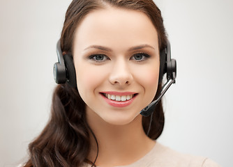 Image showing friendly female helpline operator