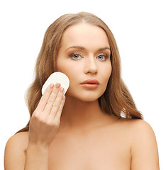 Image showing beautiful woman with cotton pad