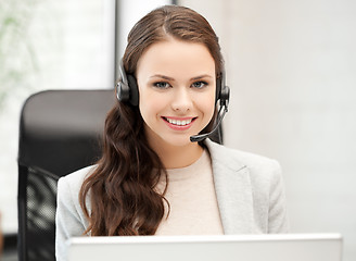 Image showing friendly female helpline operator