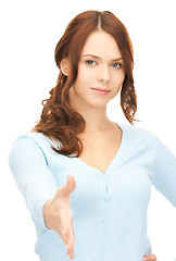 Image showing woman with an open hand ready for handshake