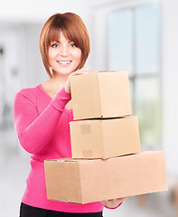 Image showing businesswoman with parcels