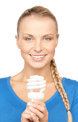 Image showing woman with energy saving bulb