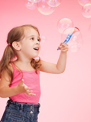 Image showing litle girl with soap bubbles