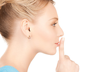 Image showing woman with finger on her lips