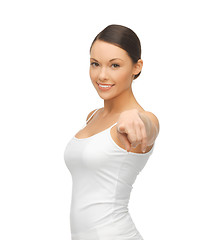 Image showing woman in blank white t-shirt pointing at you