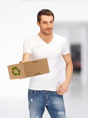 Image showing handsome man with recyclable box