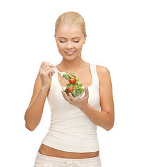 Image showing healthy woman holding bowl with salad