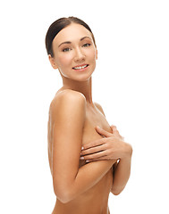 Image showing beautiful woman holding her breast