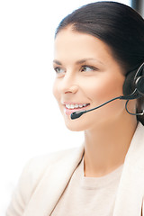 Image showing friendly female helpline operator