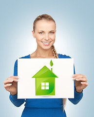 Image showing woman with illustration of green eco house