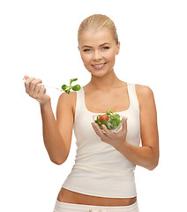 Image showing healthy woman holding bowl with salad