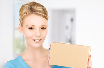 Image showing businesswoman with parcel