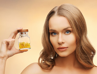 Image showing woman with vitamins