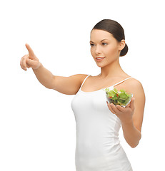 Image showing healthy woman holding bowl with salad