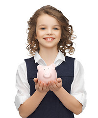 Image showing girl with piggy bank