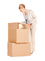 Image showing businesswoman with big boxes