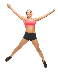 Image showing beautiful sporty woman doing exercise